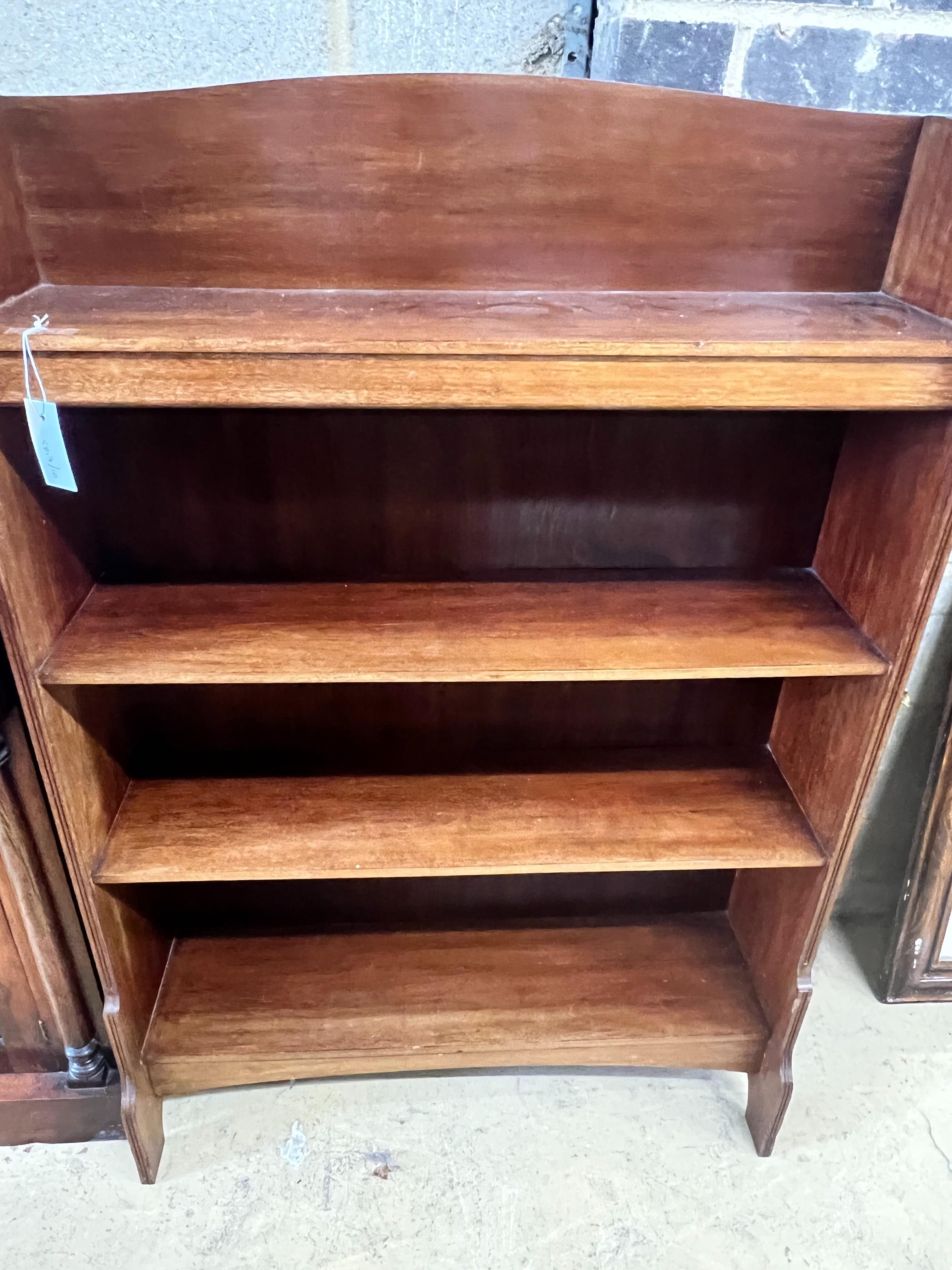 An Edwardian mahogany open bookcase, width 84cm, depth 23cm, height 122cm